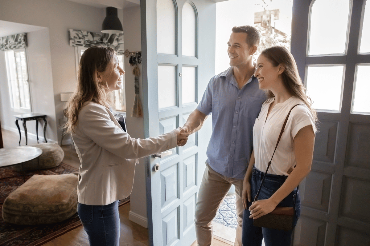 A couple touring a model home
